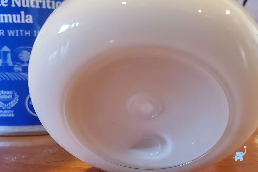 prepared bottle of the babys only infant formula