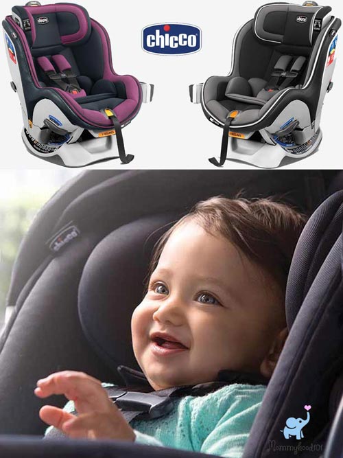 Chicco NextFit Zip Convertible Car Seat child smiling while sitting in a chicco nextfit zip