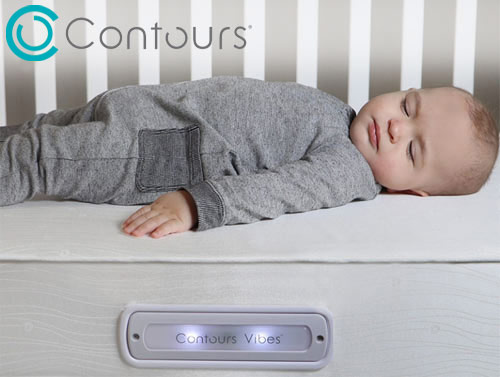 close-up of a baby sleeping on a contours vibes crib mattress
