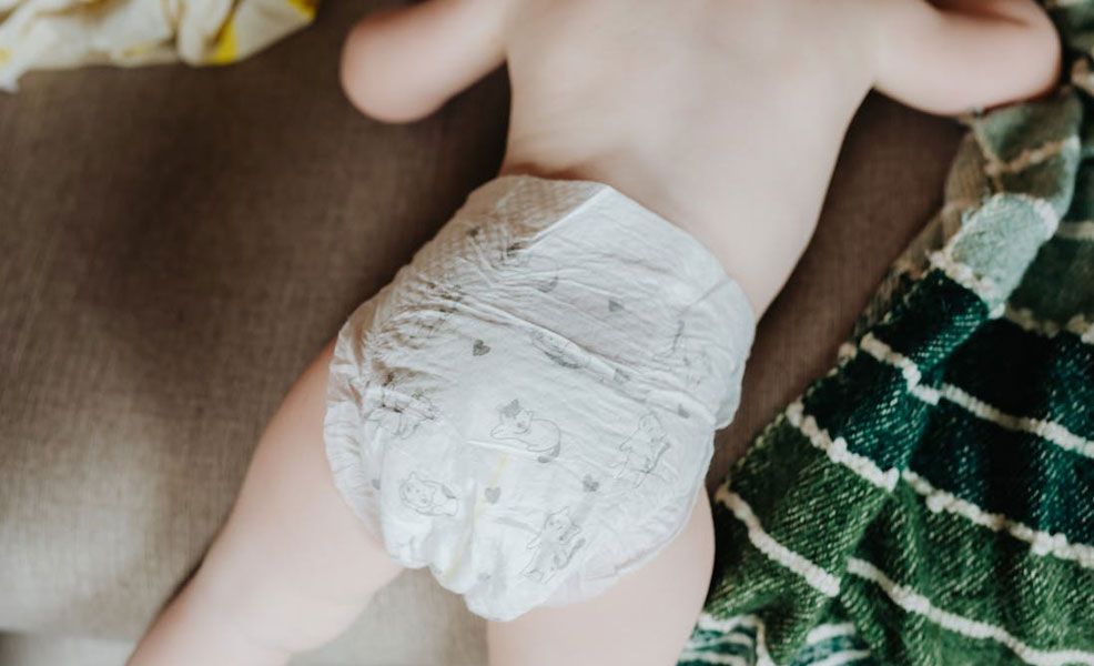 a baby getting his diaper changed