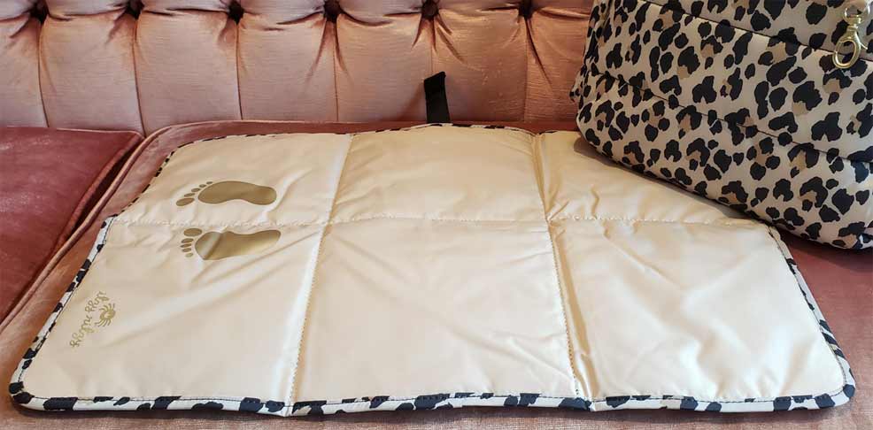 the changing pad in the itzy ritzy dream diaper bag