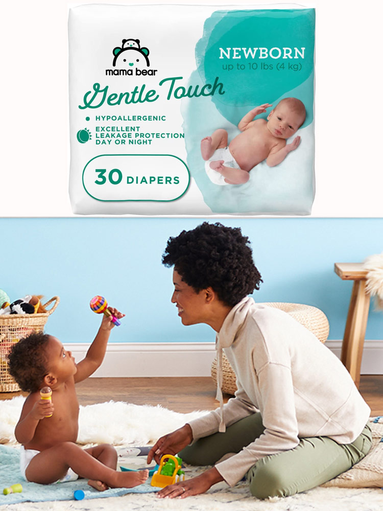 a mom playing with a baby wearing a mama bear gentle touch diaper
