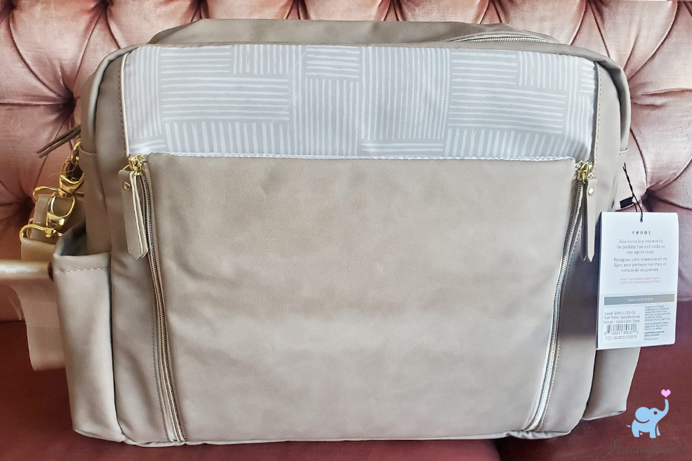 zippered changing station on the petunia pickle bottom boxy deluxe diaper bag
