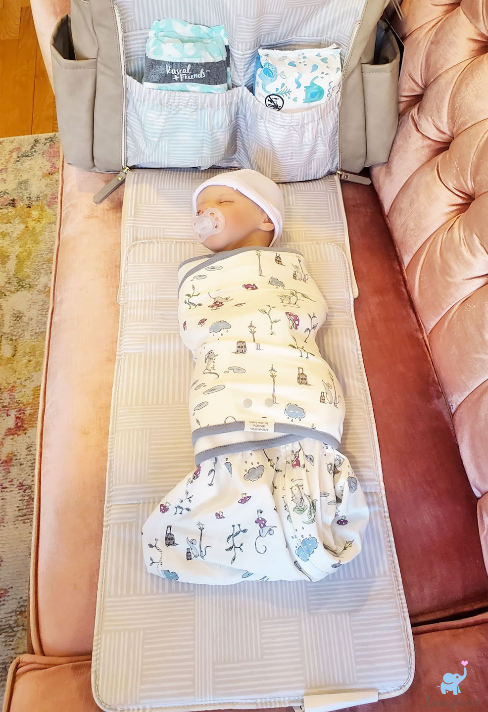 zippered changing station on the petunia pickle bottom boxy deluxe diaper bag
