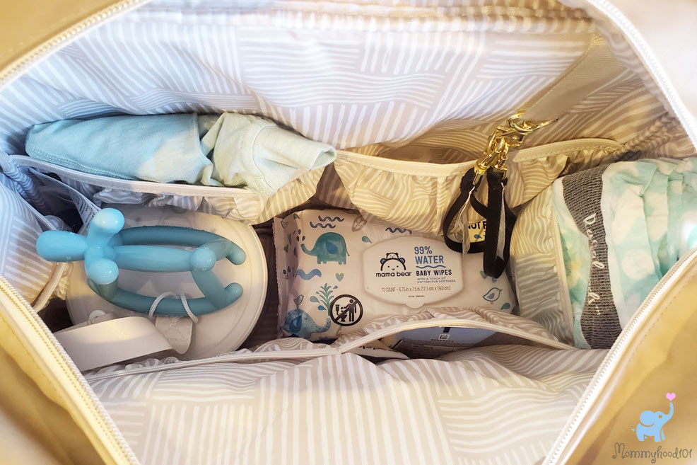 petunia pickle bottom boxy deluxe diaper bag with baby products inside